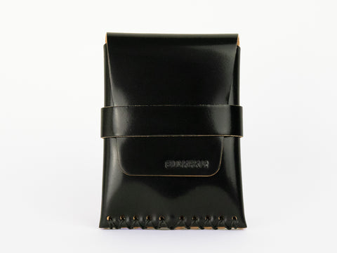 A black leather pouch with a stitched bottom edge, a flap closure, and a horizontal strap across the front. The brand name GINARA is embossed on the flap. The pouch is photographed against a white background.