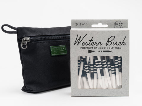 A black zippered pouch and a box labeled “Western Birch Premium Bamboo Golf Tees” containing 50 striped golf tees are displayed against a plain white background.