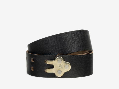 A black leather belt with a unique brass buckle shaped like a stylized bear face, displayed against a plain white background.