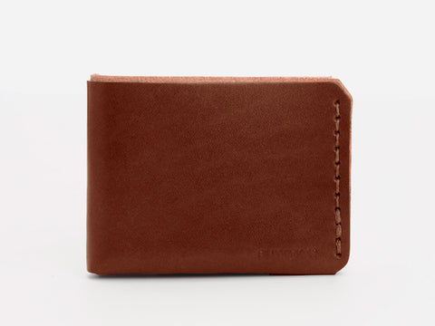 A brown leather bifold wallet with visible stitching along the right edge, displayed closed against a plain white background.