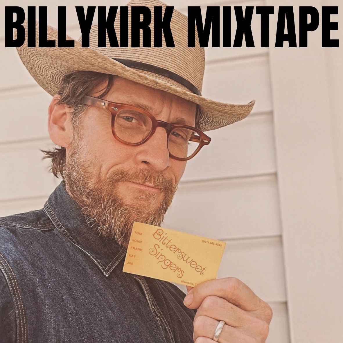 Image of person wearing straw hat holding an old concert ticket 