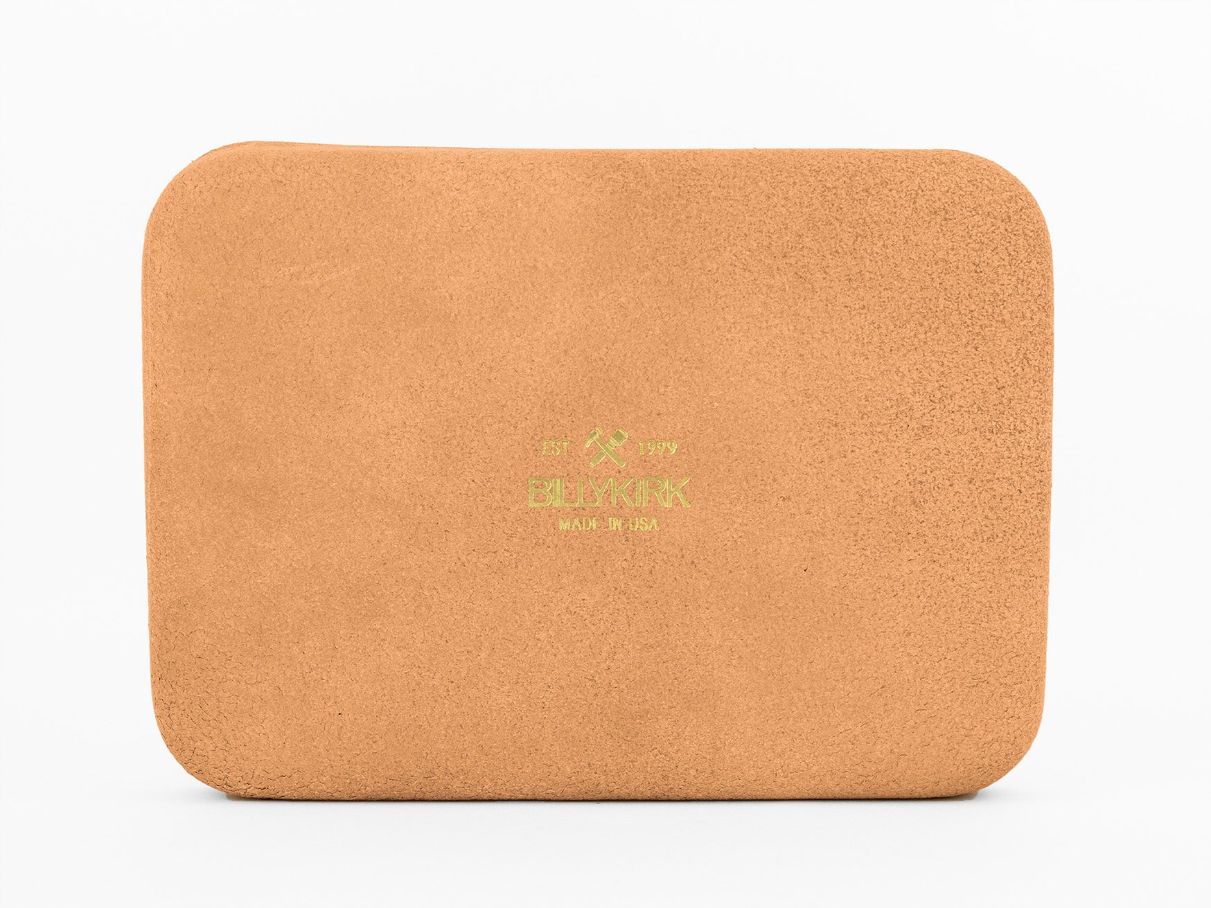 A rectangular birch-colored yoga block with rounded edges, textured surface, and green text reading B Y K K K and Made in USA on the front, displayed against a white background.