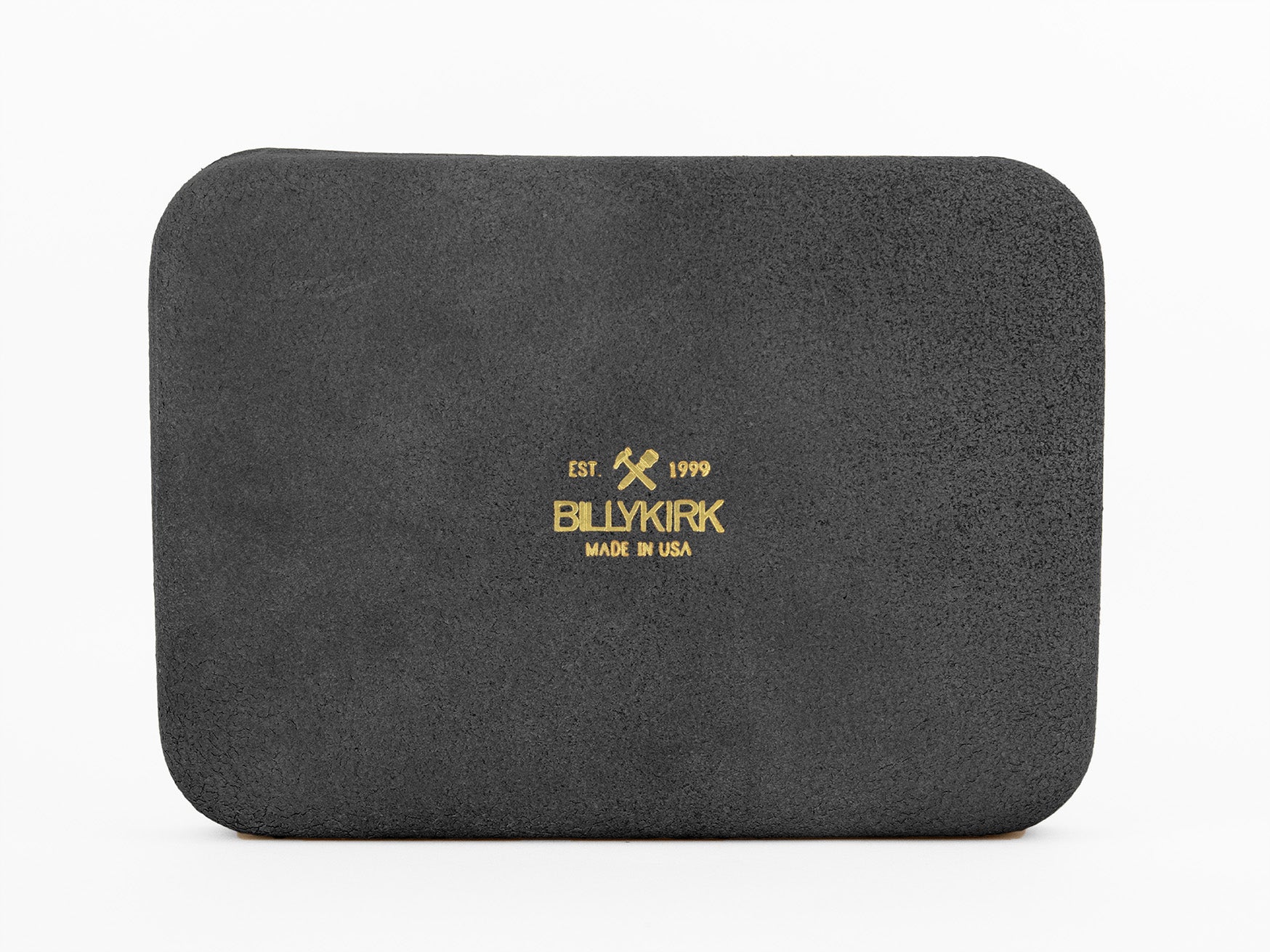 A rectangular black suede pouch featuring the Billykirk logo, two crossed hammers, EST. 1999, and MADE IN USA printed in gold lettering on the front.