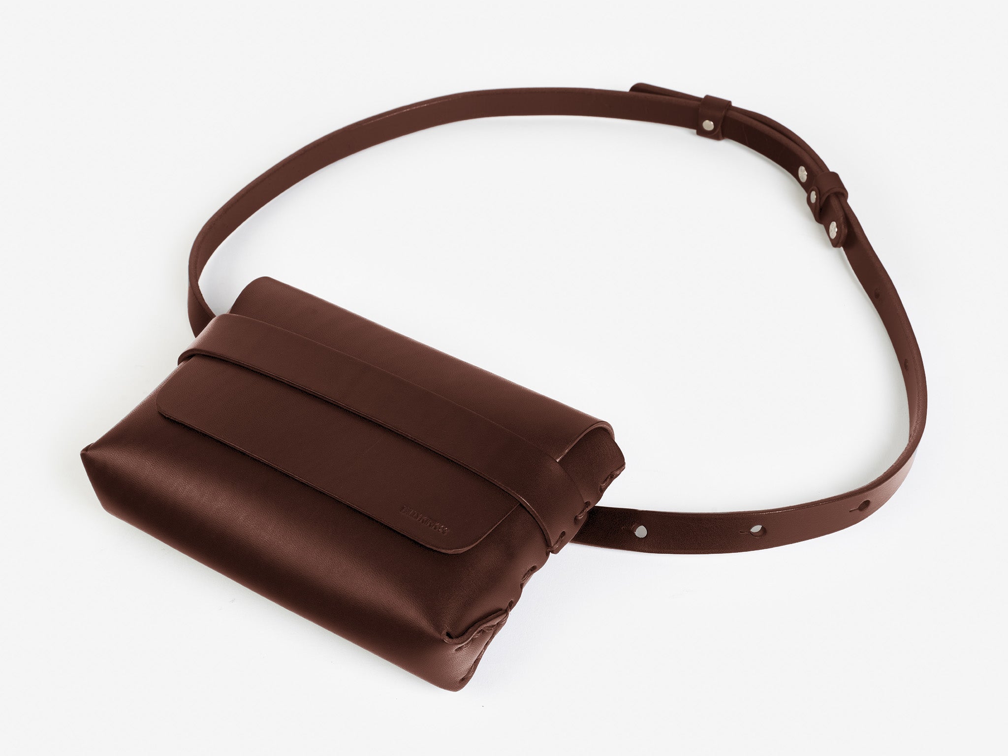 A brown leather belt bag with a rectangular pouch and adjustable strap, displayed on a white background.
