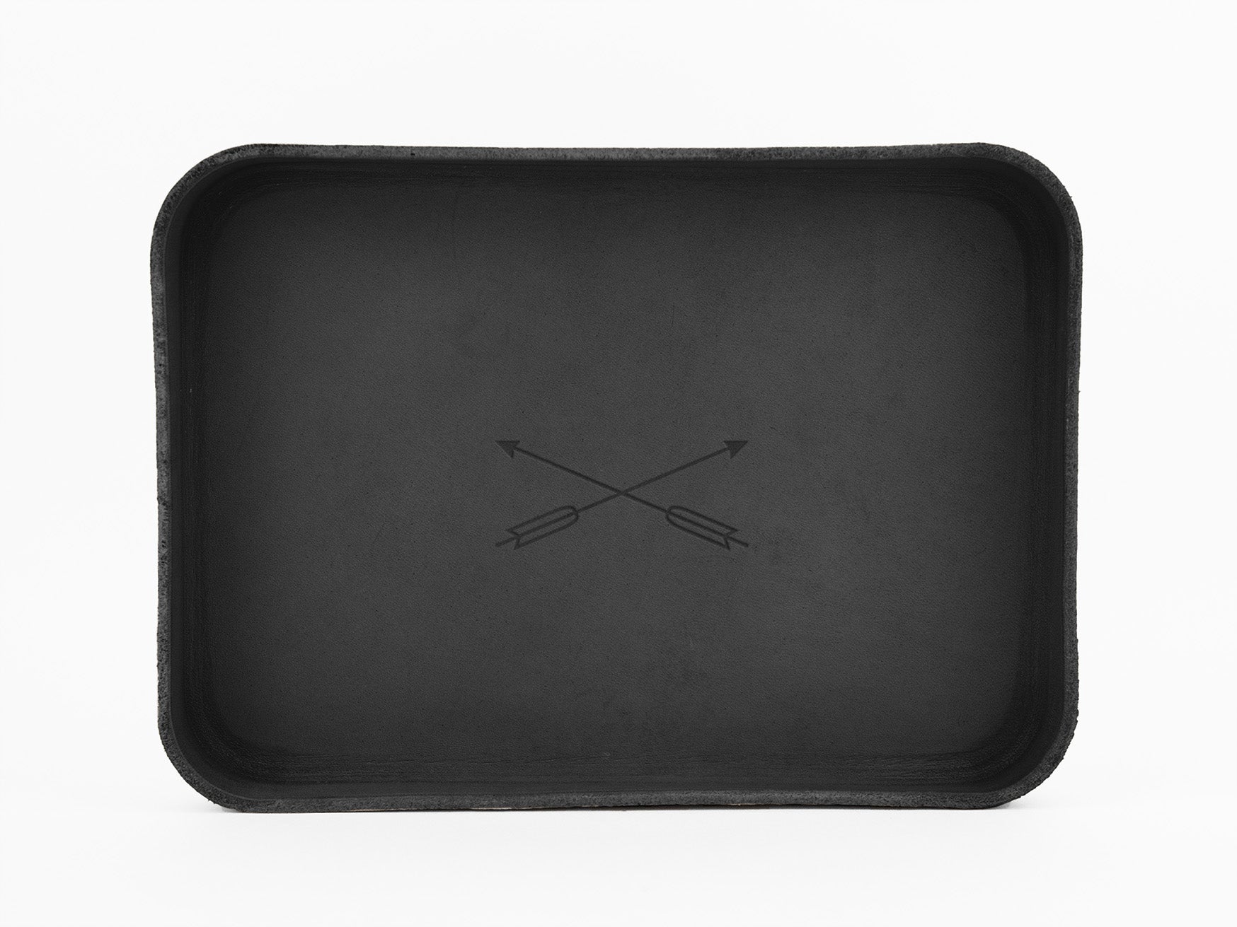 A rectangular black tray with rounded corners, featuring two crossed arrows in the center, set against a plain white background.