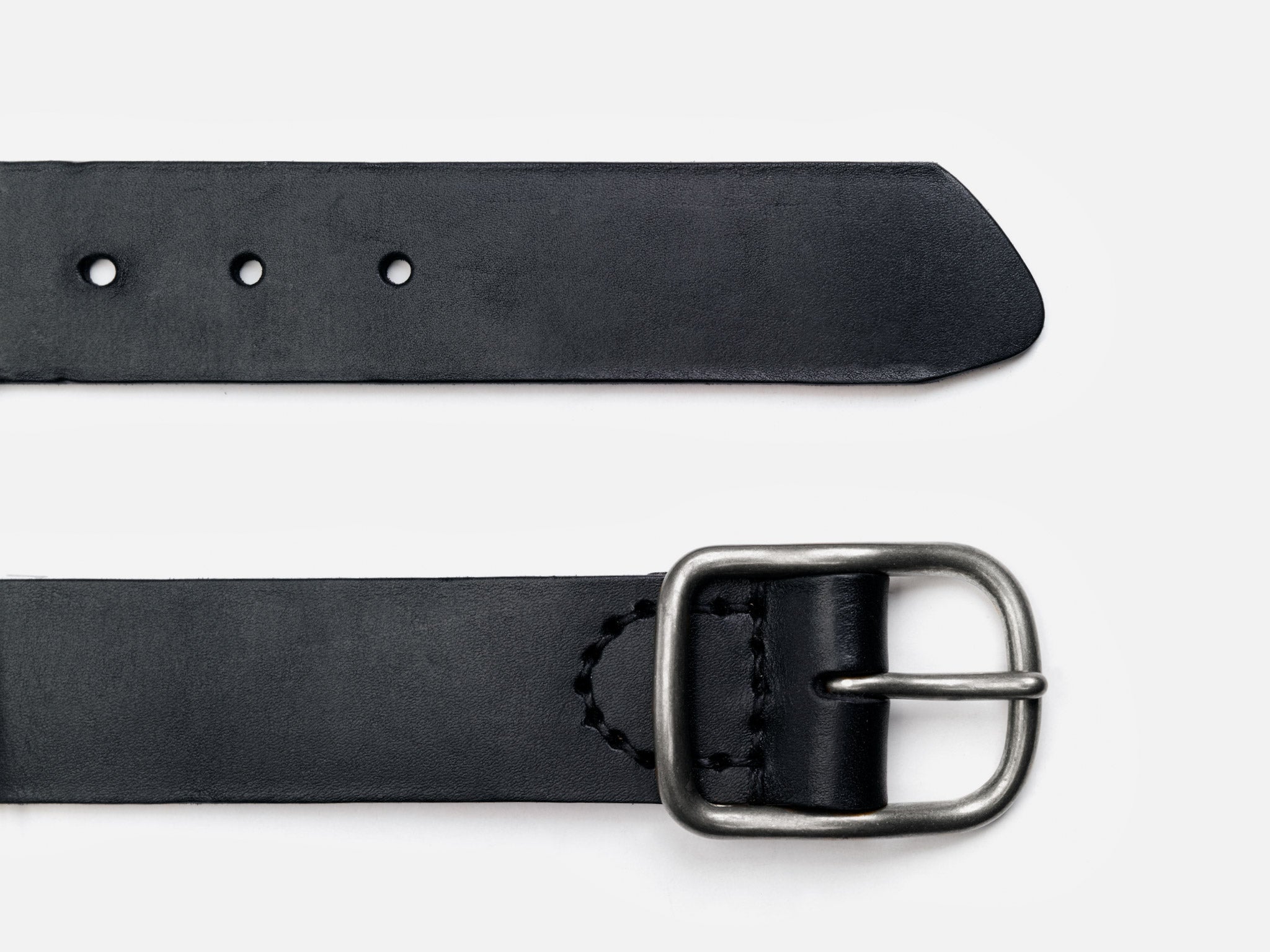 A black leather belt with a matte nickel finish buckle, displayed on a plain background.