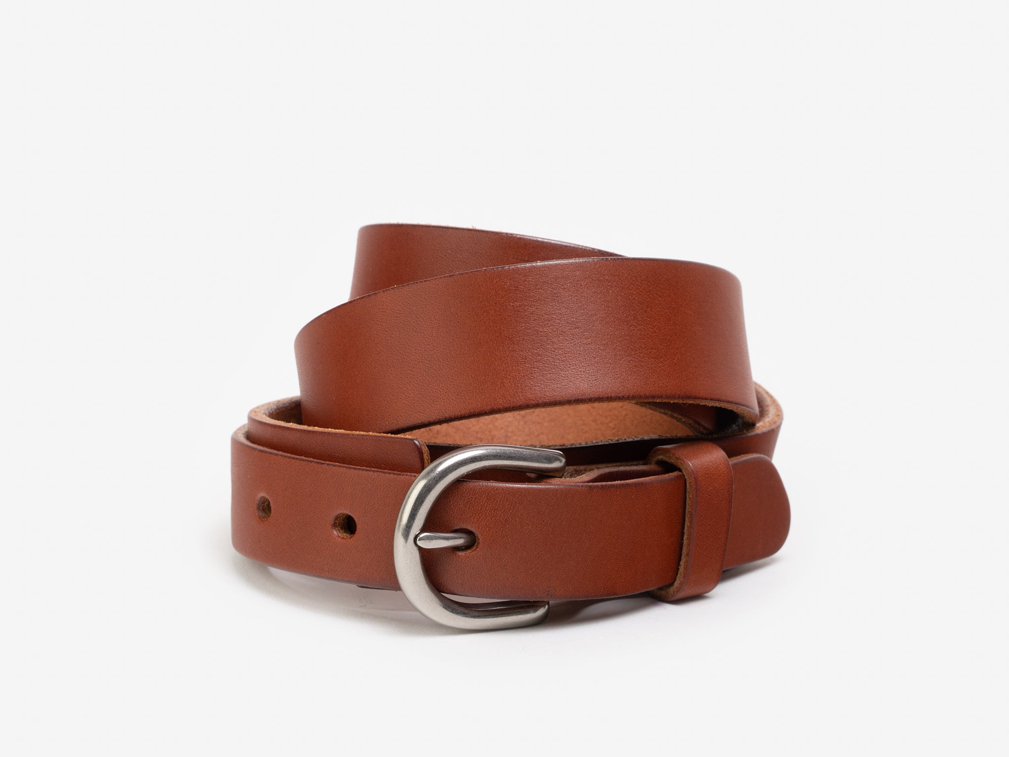 A coiled brown leather belt with a silver buckle, shown against a plain white background.