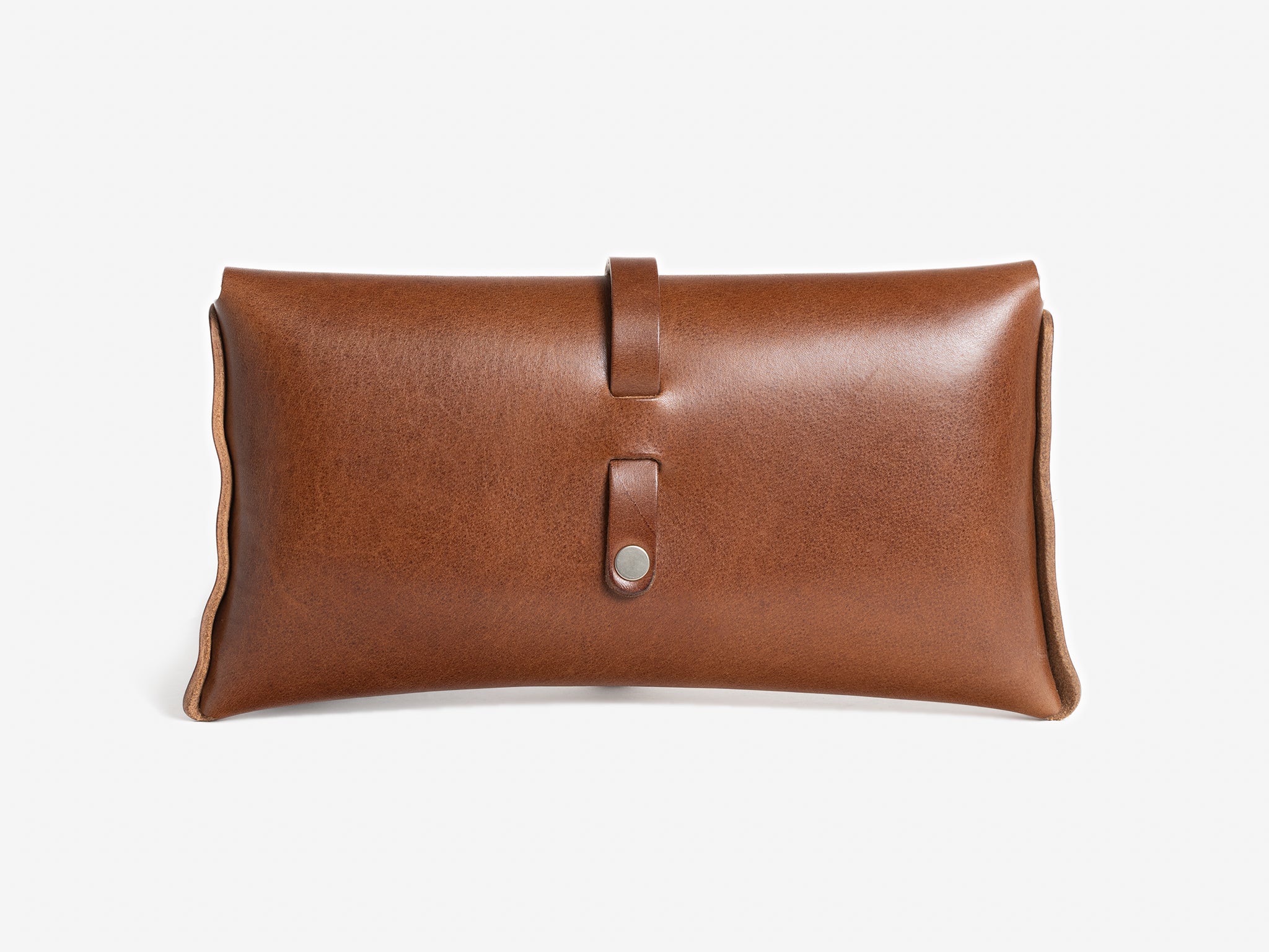 A rectangular brown leather pouch with a flap secured by a strap and snap button, displayed against a plain white background.